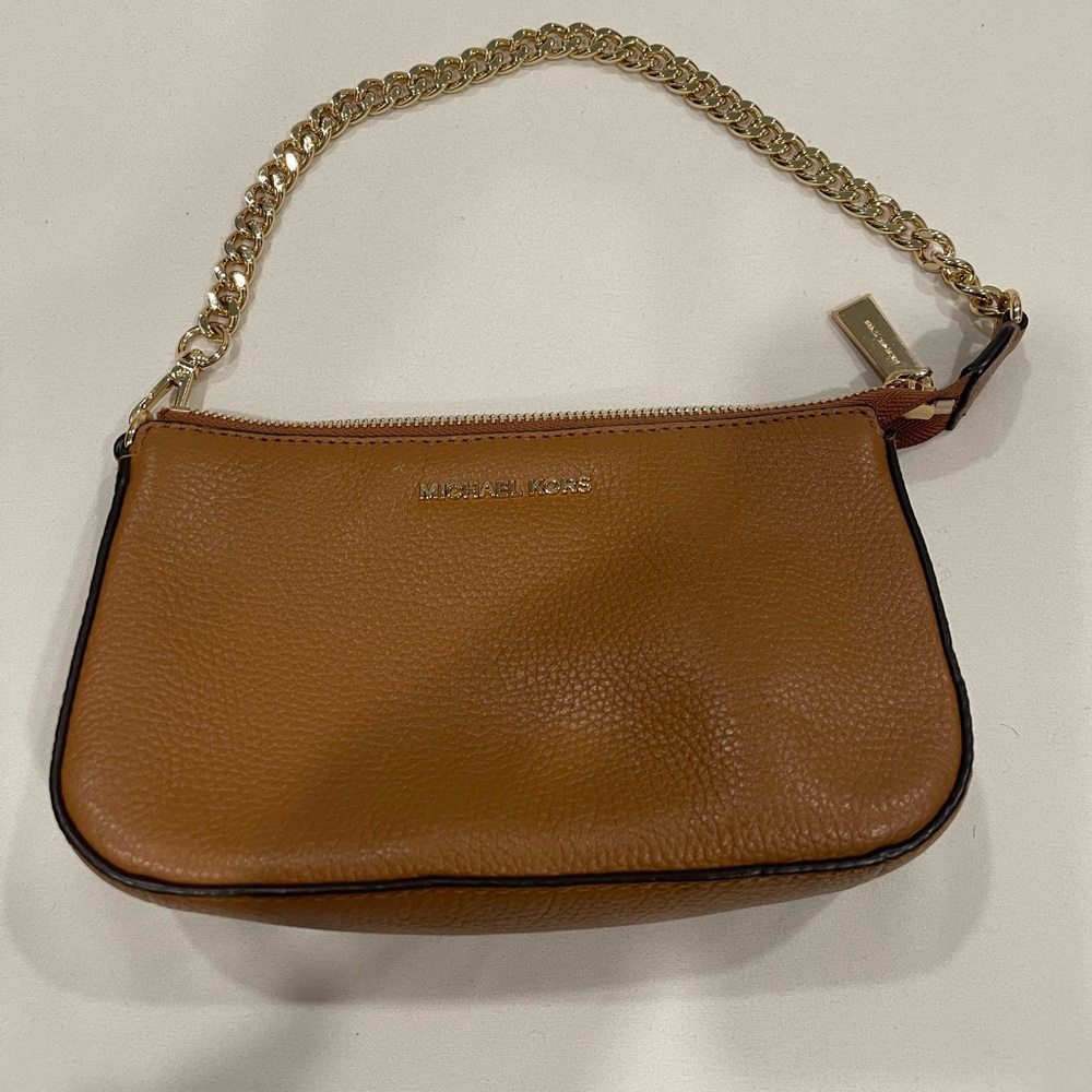 Tan Small Michael Kors bag able to be worn as wristlet or shoulder bag